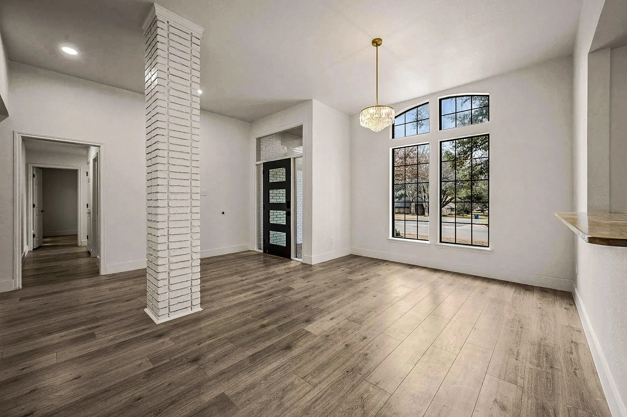 Completed Grapevine dining room showing coordinated finishes and lighting